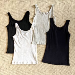 Bundle of 4 Uniqlo XS ribbed tank tops
